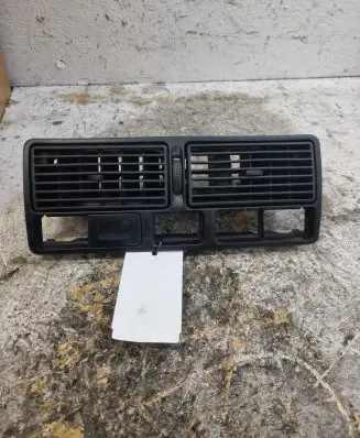 Volkswagen Golf IV Dash center air vent grill 1J0819728C
