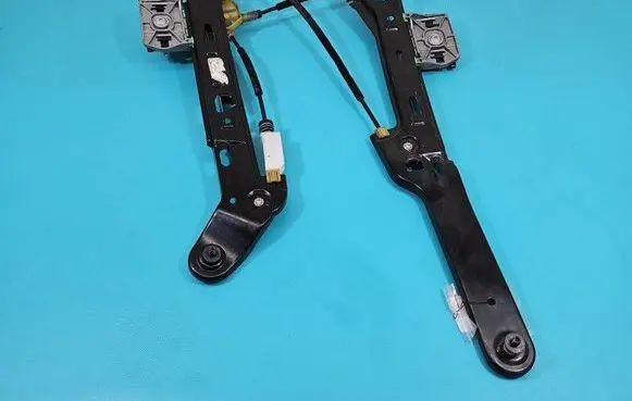 Rear door window regulator with motor