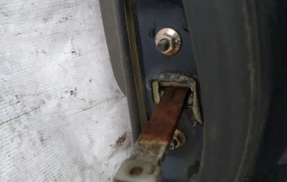 Mazda 626 Rear door check strap stopper