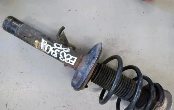 BMW X3 E83 Front shock absorber with coil spring