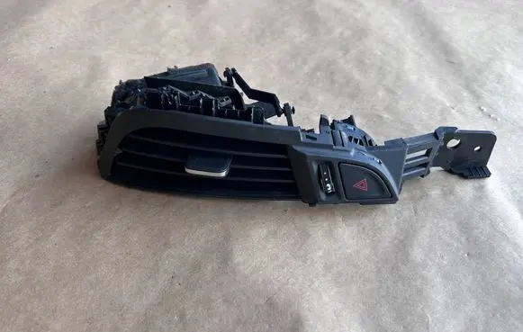Cadillac ATS Dashboard side air vent grill/cover trim 23108719