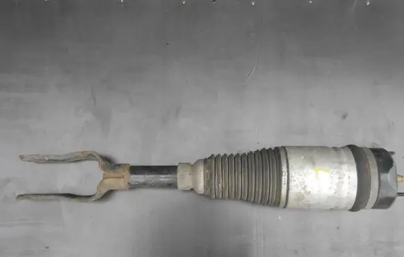 Jeep Grand Cherokee Front shock absorber with coil spring