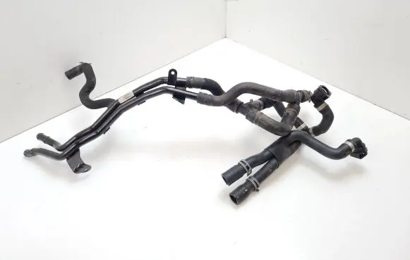 Volkswagen PASSAT B8 Engine coolant pipe/hose 5Q0121065H