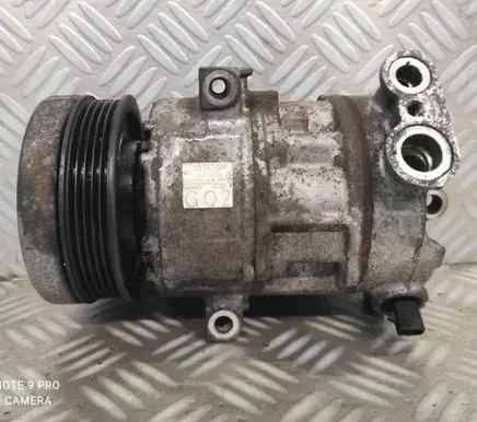 Opel Corsa D Air conditioning (A/C) compressor (pump) 55701200