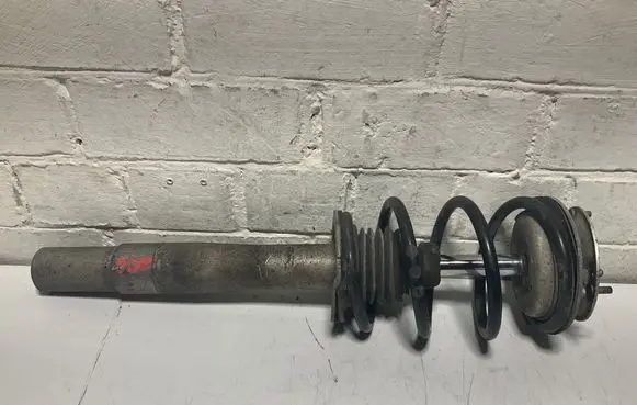 Front shock absorber with coil spring