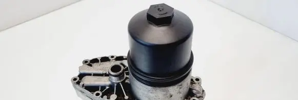Jaguar XF X250 Oil filter mounting bracket 9X2Q6B624BA
