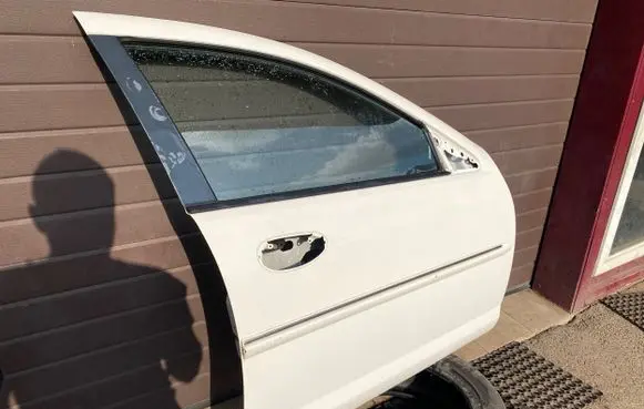 Chrysler Sebring (ST-22 - JR) Front door