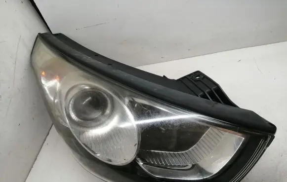 Hyundai Tucson TL Headlight/headlamp 02A011A00 12712 12713
