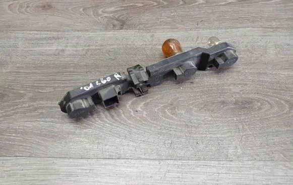 Volvo S60 Tail light bulb cover holder 153852