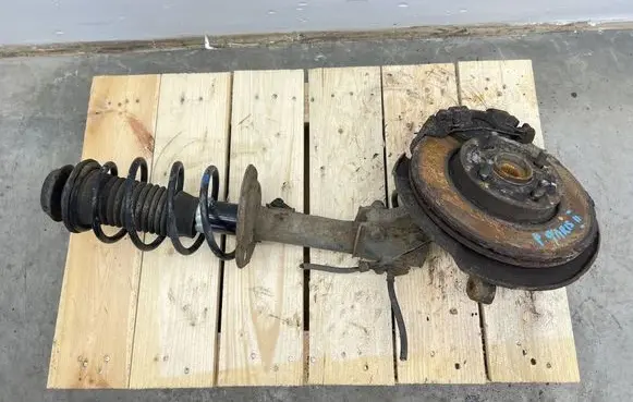 Toyota Yaris Front shock absorber with coil spring 