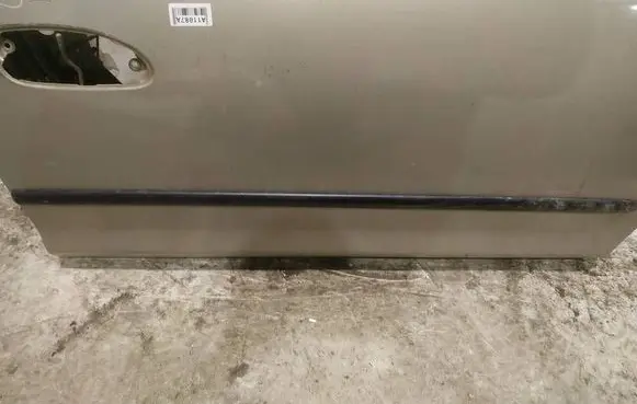 Mazda 323 Front door trim (molding) 