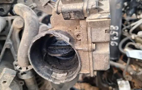 Volkswagen Touran I Throttle valve 03g128063c a2c53099815