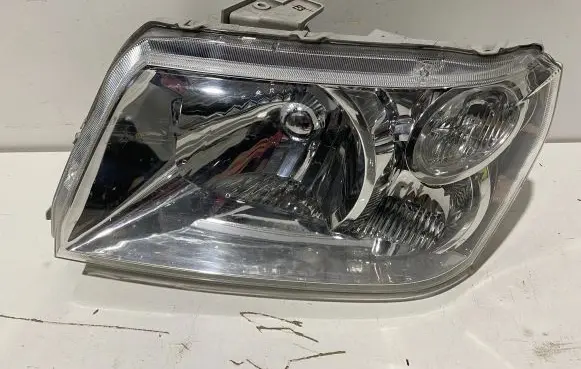 Suzuki Grand Vitara II Headlight/headlamp 10059076
