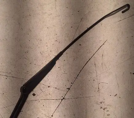 Front wiper blade arm