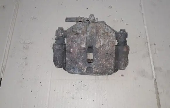 KIA Carens II Front brake caliper NOCODE