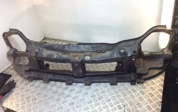 Radiator support slam panel