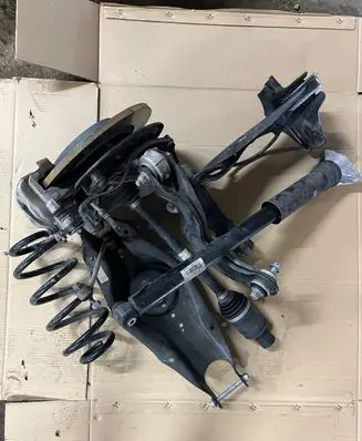 Rear wheel hub spindle/knuckle