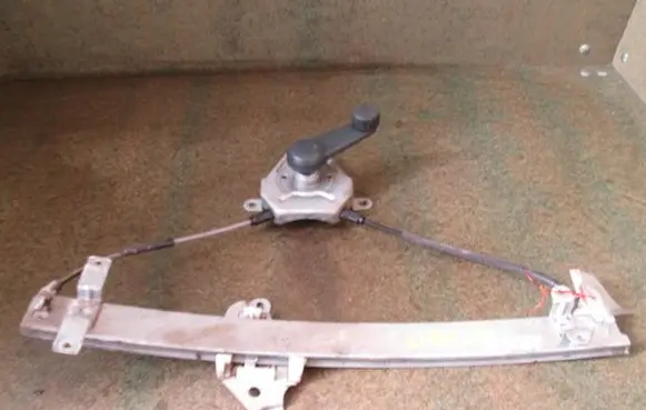 Nissan Almera Front door window regulator with motor