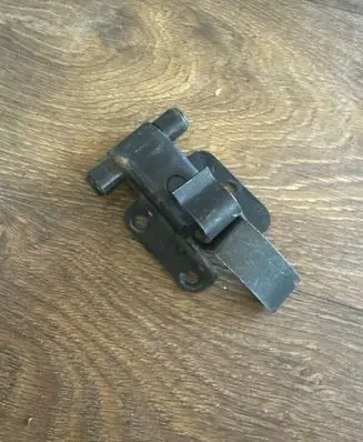 Front door check strap stopper