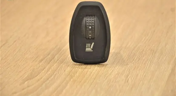 Seat heating switch