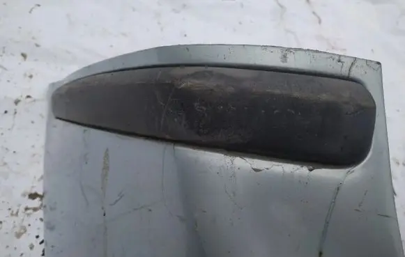 Rear bumper trim bar molding