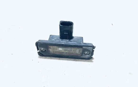Volkswagen Golf V Number plate light 1J6943021B
