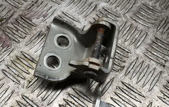 Front door lower hinge