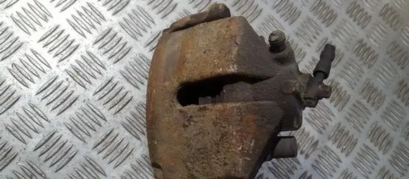 Volkswagen Golf V Front brake caliper