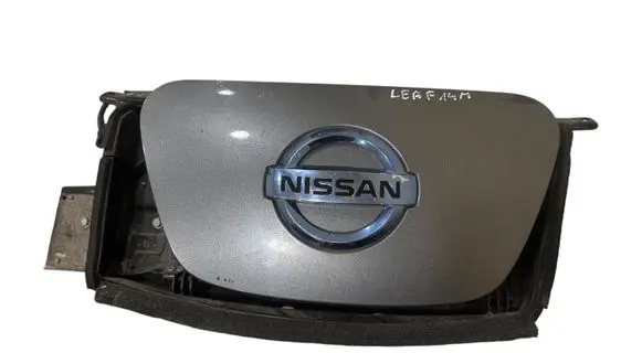 Nissan Leaf I (ZE0) Electric car charge socket cover 657373NK1B