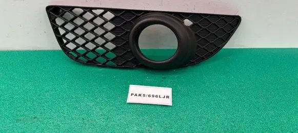 Mitsubishi Lancer VIII Front fog light trim/grill 8321A089