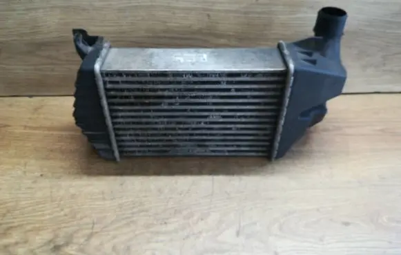 Opel Zafira B Intercooler radiator 13213402 WTP8630
