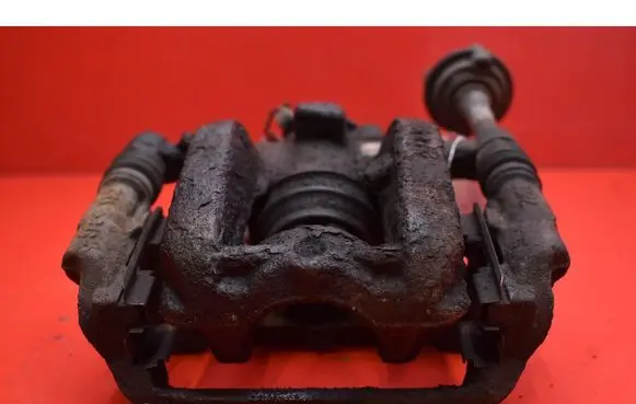 Opel Astra J Rear brake caliper 13407129