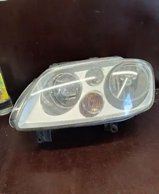 Volkswagen Touran I Headlight/headlamp 0301205203 1T0941005R