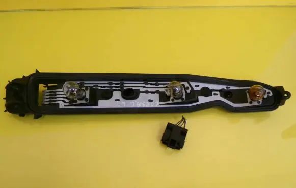 Opel Corsa C Tail light bulb cover holder