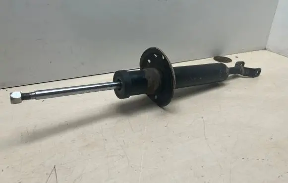 Volkswagen PASSAT B5 Front shock absorber/damper 3734235EGT