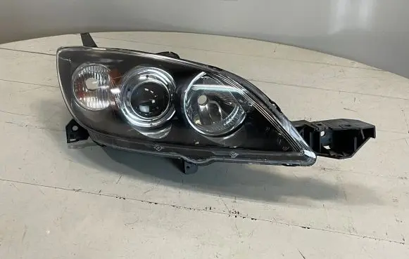 Mazda 3 I Headlight/headlamp 8651000650