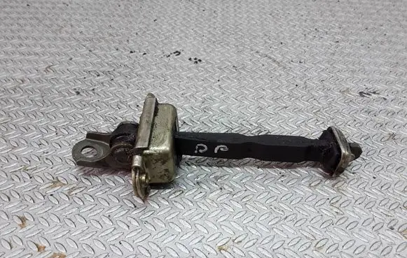 Nissan Primera Front door check strap stopper