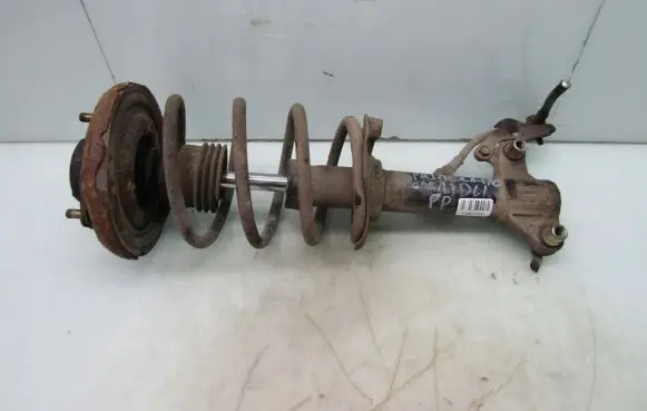 Nissan Primera Front shock absorber with coil spring