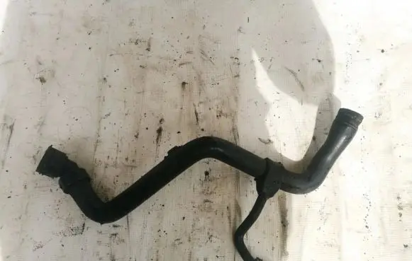 Volkswagen PASSAT B5 Engine coolant pipe/hose 4b0121101e