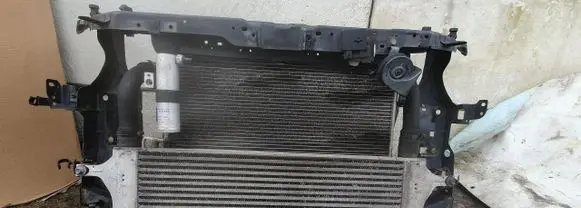 Radiator support slam panel