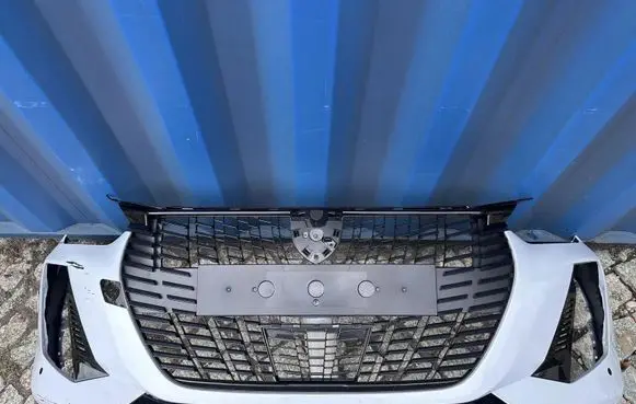 Peugeot 208 II Front bumper upper radiator grill 9855772080