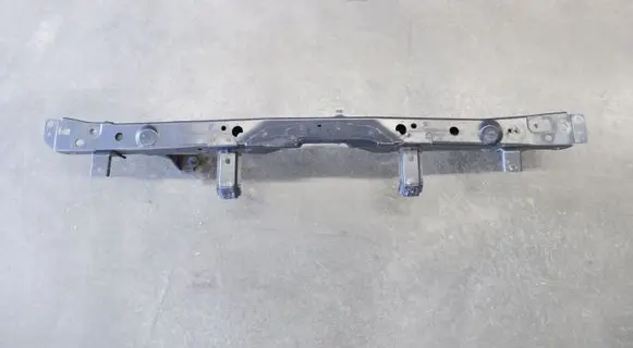 Top upper radiator support slam panel