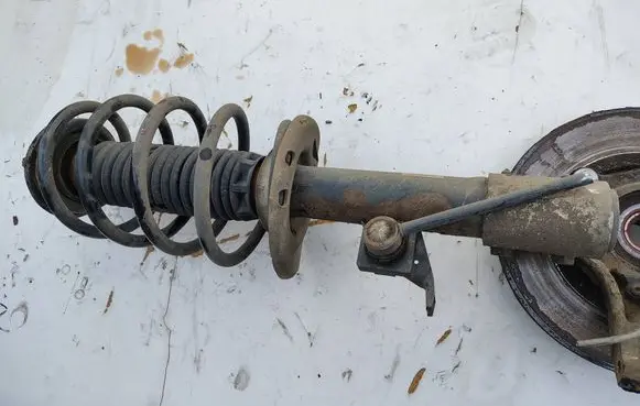 Citroen Berlingo Front shock absorber with coil spring
