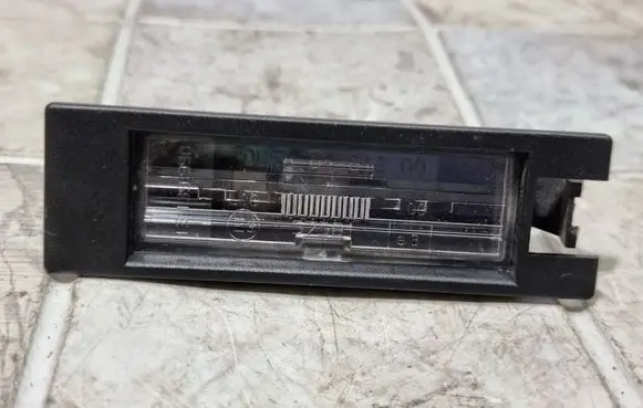 Opel Astra H Number plate light 13139990