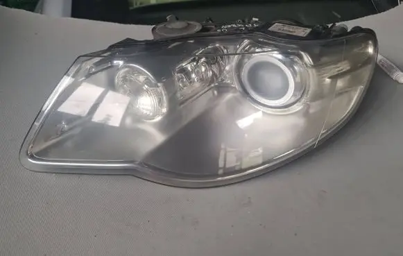 Volkswagen Touareg I Headlight/headlamp 7L6941031C 1ZS00945201 00945201118901