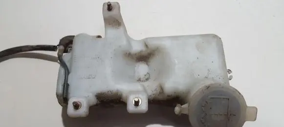 Mazda 626 Windshield washer fluid reservoir/tank 860141219 860141-219