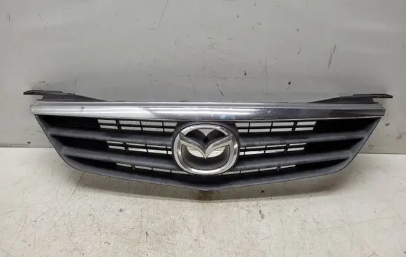 Mazda 626 Front bumper upper radiator grill