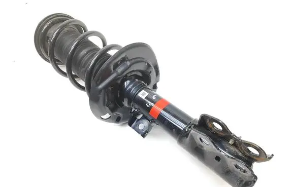 Toyota Yaris XP210 Front shock absorber with coil spring 48520K0080