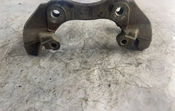 Ford Focus Front Brake Caliper Pad/Carrier 