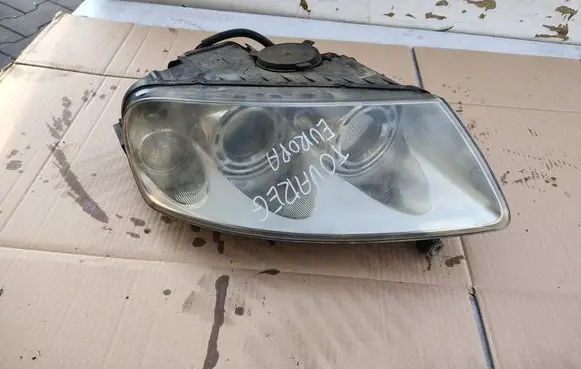 Volkswagen Touareg I Headlight/headlamp 7L6941016CF